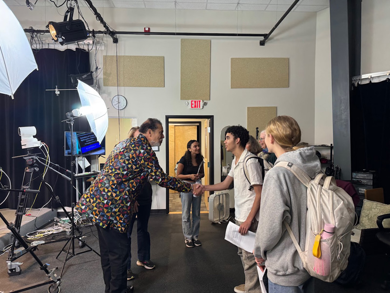 Leo Frame meets students and teachers after his interview.