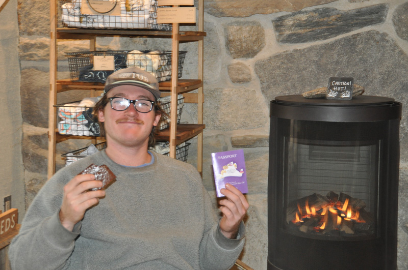 Tom Smith with his brownie and his bake off passport at Beetlebung.