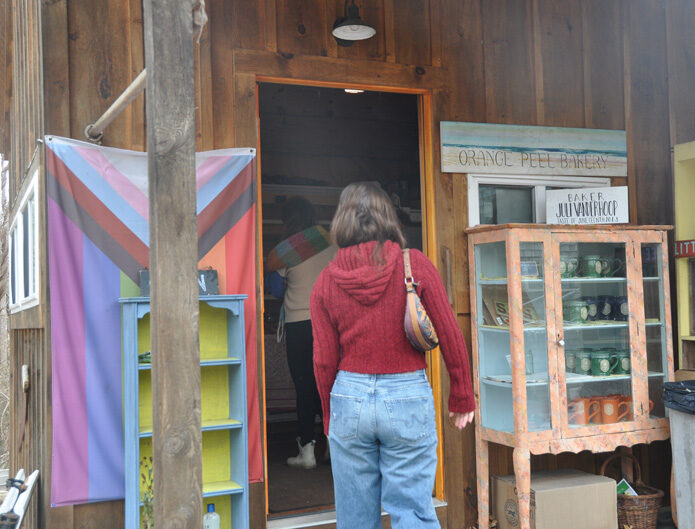 Shannon Cox enters Orange Peel Bakery.