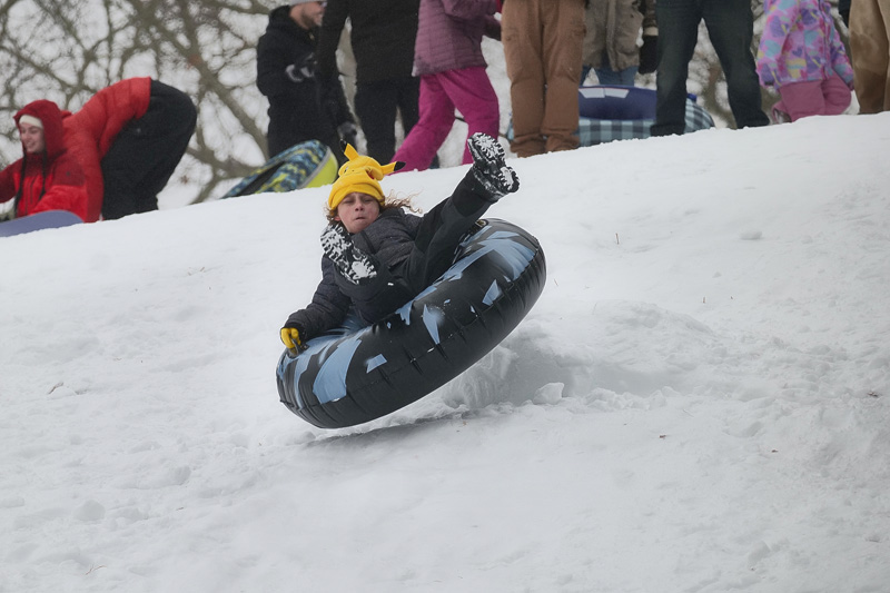 Islanders sledding after a Winter storm brought roughly a foot of snow.