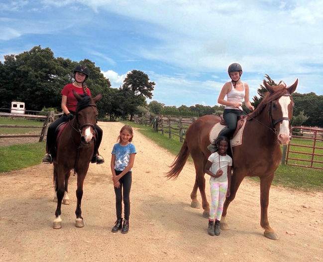 Summer is complete with a horseback ride outside.