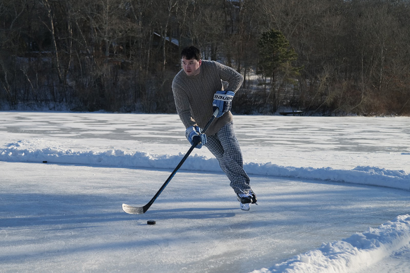 Kevin DeGulis of West Tisbury playing hockey on Duarte’s Pond in West Tisbury.