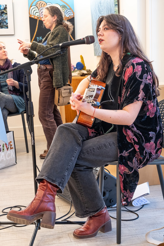 Sarah Shaw Dawson singing at the Island Authors Book Fair.