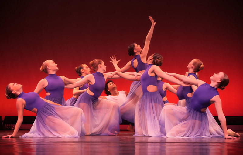 Junior Company performs “Bridge Over Troubled Waters.”