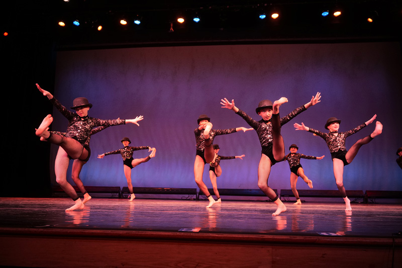 Mini Company performs “New York, New York.”